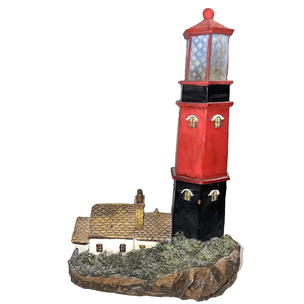 Hand Painted Lighthouse with a cottage stands 7 inches tall